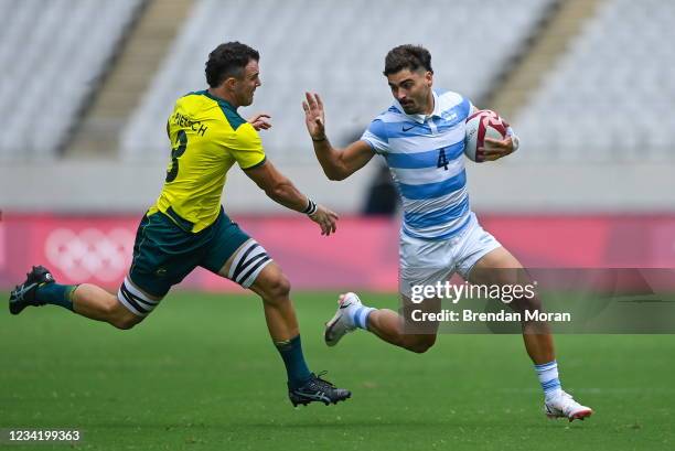 Tokyo , Japan - 26 July 2021; Ignacio Mendy of Argentina in action against Lewis Holland of Australia during the rugby sevens men's pool A match...