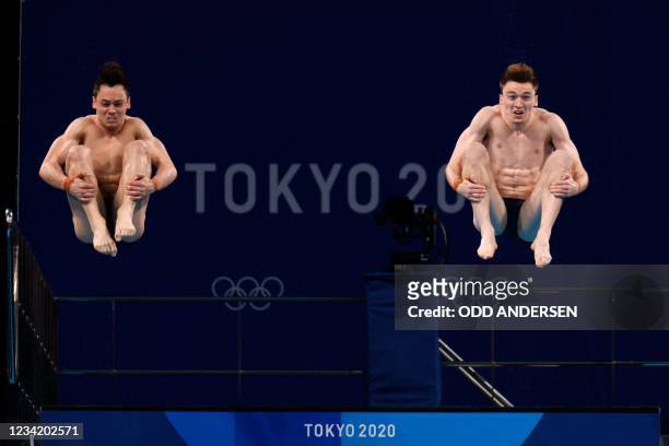 Britain's Thomas Daley and Britain's Matty Lee compete in the men's synchronised 10m platform diving final event during the Tokyo 2020 Olympic Games...