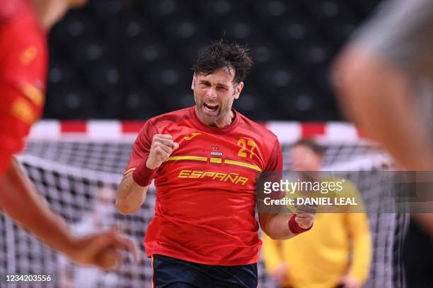Spain's left back Antonio Garcia celebrates after scoring during the men's preliminary round group A handball match between Spain and Norway of the...
