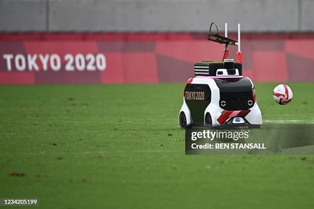 An automated vehicle is used to carry the ball onto the pitch before the men's pool A rugby sevens match between Australia and South Korea during the...