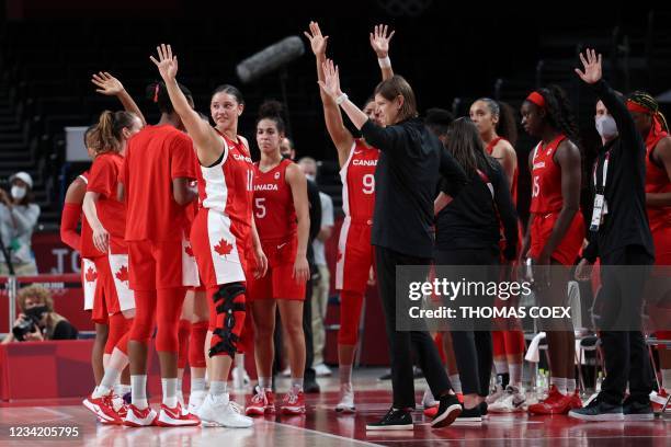 Canada's team wave after their defeat against Serbia in the women's preliminary round group A basketball match between Serbia and Canada during the...