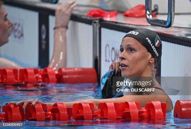Italy's Federica Pellegrini reacta after a heat for the women's 200m freestyle swimming event during the Tokyo 2020 Olympic Games at the Tokyo...