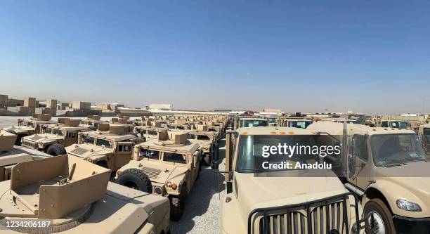 Military vehicles are seen after the US-led coalition against Daesh provided military vehicle assistance to the Peshmerga forces of Iraq's Kurdish...