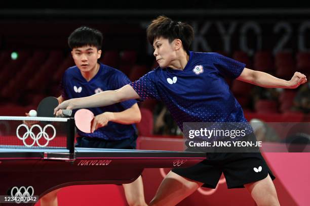 Taiwan's Lin Yun-ju and Cheng I-ching compete against France's Emmanuel Lebesson and Jia Nan Yuan in the mixed doubles table tennis match for the...