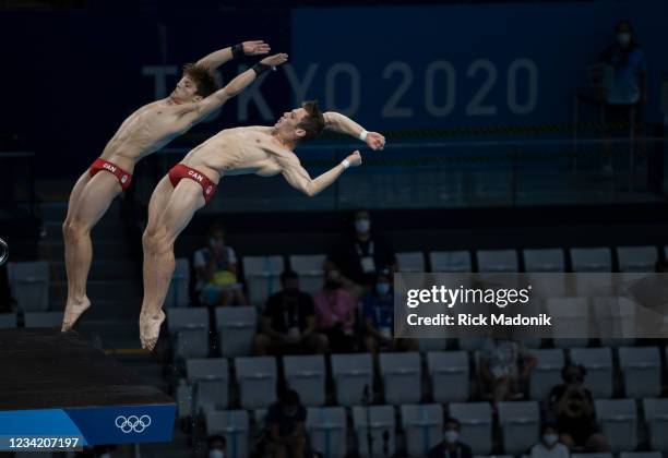 Tokyo, Japan Nathan Zsombor-Murray and Vincent Riendeau compete in Mens 10M platform Synchronised diving finals at Tokyo Aquatic Centre. All part of...