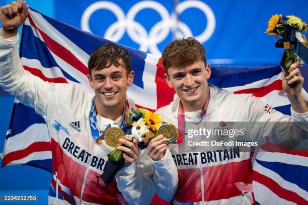 Matty Lee and Thomas Daley of Great Britain celebrate with their gold medals during the medal presentation for the Men's Synchronised 10m Platform...