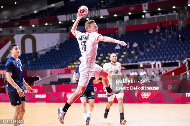 Tim Kastening of Germany compete on day three in the Men's First Round Group A match between Argentina and Germany during the Tokyo 2020 Olympic...