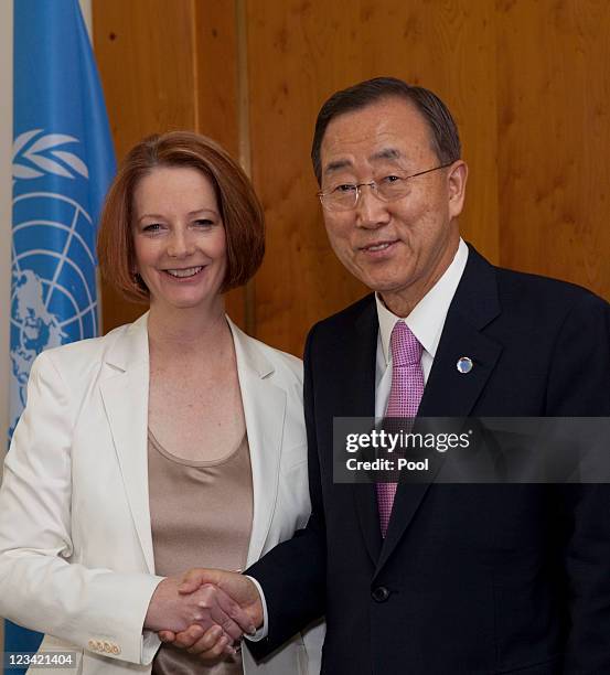 Secretary General Ban Ki-moon shakes hands with Australian Prime Minister Julia Gillard at Parliament House on September 3, 2011 in Canberra,...