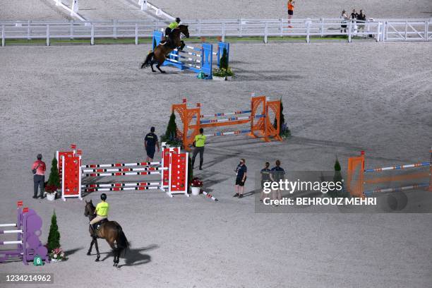 Riders from Brazil attend a jumping training during the Tokyo 2020 Olympic Games at the Equestrian Park in Tokyo on July 26, 2021.