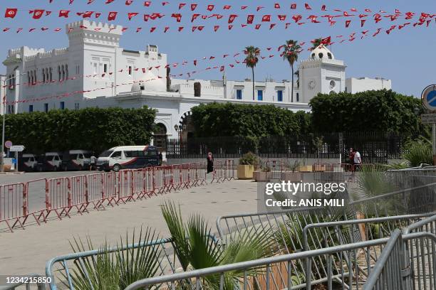 The government headquarters is barricaded at the Casbah square in the Tunisian capital Tunis on July 26, 2021. - Tunisian police closed the office of...