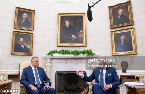 President Joe Biden meets with Iraqi Prime Minister Mustafa Al-Kadhimi in the Oval Office of the White House in Washington, DC, July 26, 2021.