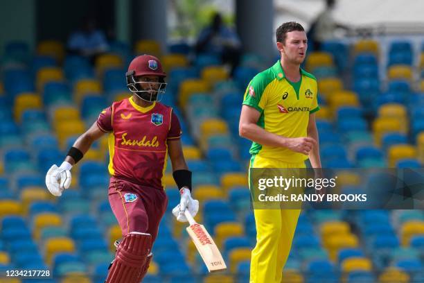 Josh Hazlewood of Australia looks to the boundary as Shai Hope of West Indies run during the 3rd and final ODI between West Indies and Australia at...