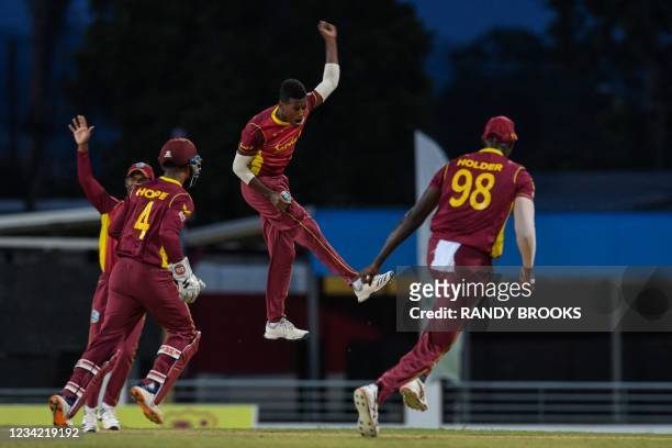 Akeal Hosein of West Indies celebrates the dismissal of Moises Henriques of Australia during the 3rd and final ODI between West Indies and Australia...