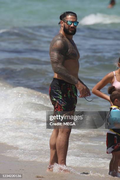 Roman Reigns is seen at the beach on July 26, 2021 in Miami, Florida.