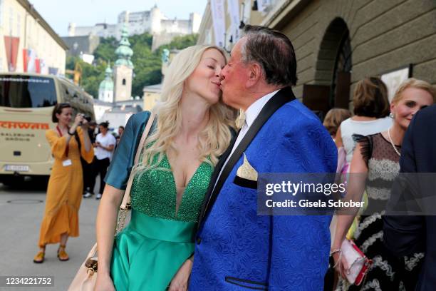 Richard "Moertel" Lugner and Simone "Bienchen" Reilaender attend the premiere of "Don Giovanni" during the Salzburg Opera Festival 2021 at grosses...