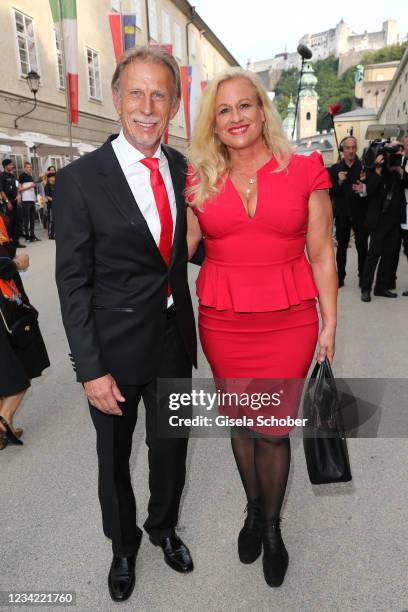 Christoph Daum and his wife Angelica Camm-Daum attend the premiere of "Don Giovanni" during the Salzburg Opera Festival 2021 at grosses Festspielhaus...