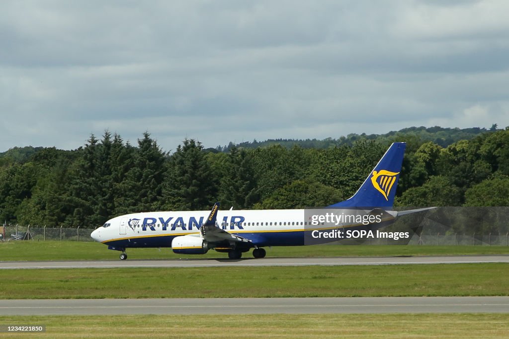 A Ryanair aircraft lands at Edinburgh Airport...