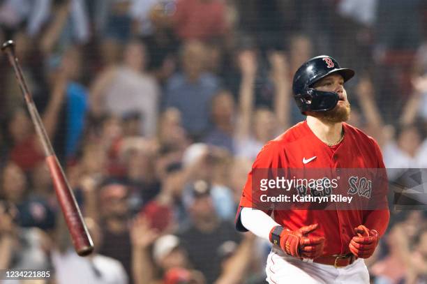 Alex Verdugo of the Boston Red Sox flips his bat after hitting a two run home run in the eighth inning against the Toronto Blue Jays at Fenway Park...