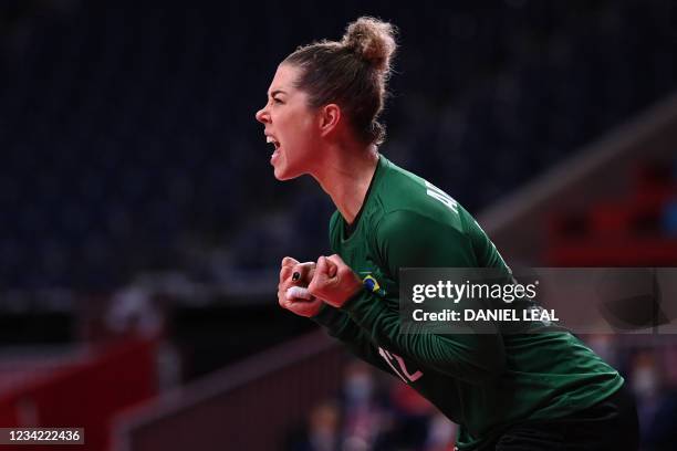 Brazil's goalkeeper Barbara Elisabeth Arenhart reacts during the women's preliminary round group B handball match between Brazil and Hungary of the...