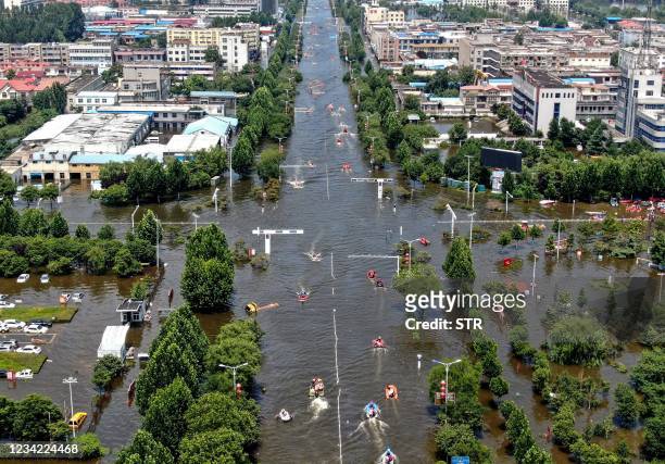 This aeiral photo taken on July 26, 2021 shows a flooded area in Weihui, Xinxiang city, in China's central Henan province. - China OUT / China OUT