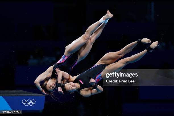 Mun Yee Leong and Pandelela Pamg of Team Malaysia compete during the Women's Synchronised 10m Platform Final on day four of the Tokyo 2020 Olympic...