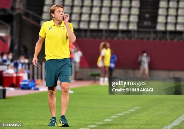 Australia's coach Tony Gustafsson watches his players during the Tokyo 2020 Olympic Games women's group G first round football match between USA and...