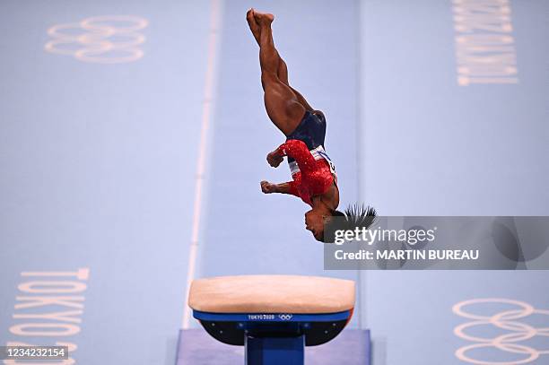 S Simone Biles competes in the vault event of the artistic gymnastics women's team final during the Tokyo 2020 Olympic Games at the Ariake Gymnastics...