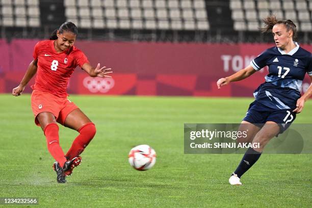 Canada's defender Jayde Riviere passes the ball next to Britain's forward Georgia Stanway during the Tokyo 2020 Olympic Games women's group E first...