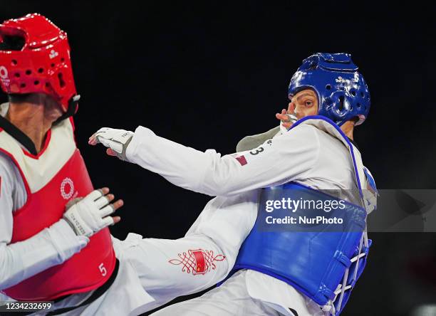 Hongyi Sun from China and Ivan Sapina from Croatia during Taekwondo at the Olympics at Makuhari Messe Hall A, Tokyo, Japan on July 27, 2021.