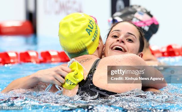 Kaylee McKeown R of Australia celebrates with teammate Emily Seebohm after the final of women's 100m backstroke of the 2020 Olympics at Tokyo...
