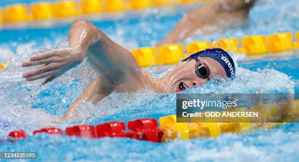 Norway's Henrik Christiansen competes in a heat for the men's 800m freestyle swimming event during the Tokyo 2020 Olympic Games at the Tokyo Aquatics...
