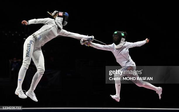 Estonia's Katrina Lehis compete against South Korea's Choi Injeong in the women's team epee gold medal bout during the Tokyo 2020 Olympic Games at...