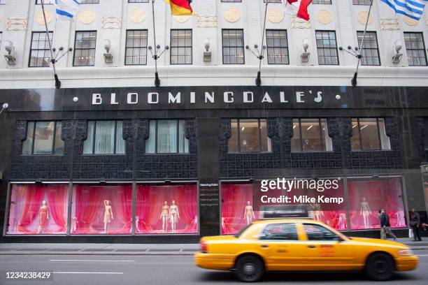 New York Yellow Taxi cab passes famous department store Bloomingdale's on 59th Street & Lexington Avenue on 19th May 2007 in New York City, United...