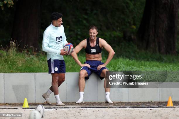 James Justin of Leicester City and Jonny Evans of Leicester City during a Leicester City training session at Pennyhill Park on July 27, 2021 in...