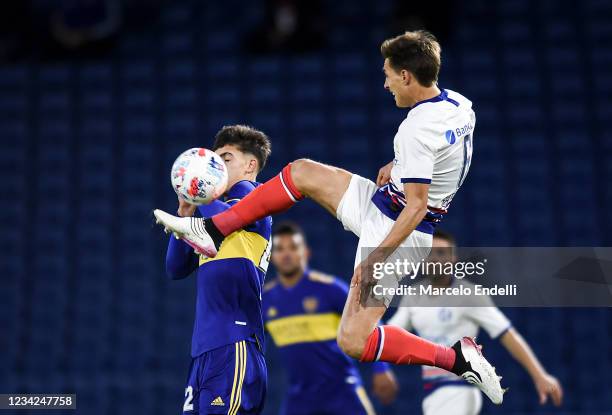 Federico Gattoni of San Lorenzo kicks the ball during a match between Boca Juniors and San Lorenzo as part of Torneo Liga Profesional 2021 at Estadio...