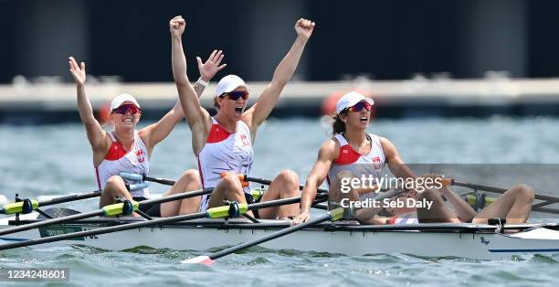 Tokyo , Japan - 28 July 2021; Poland rowers, from left, Agnieszka Kobus-Zawojska, Marta Wielczko, Maria Sajdak and Katarzyna Zillmann celebrate after...