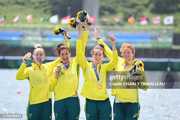 Gold medallists Australia's Lucy Stephan, Rosemary Popa, Jessica Morrison and Annabelle Mcintyre celebrate on the podium following the women's four...