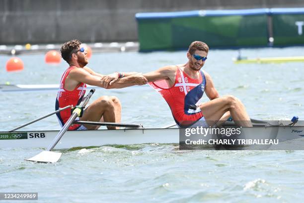 Serbia's Martin Mackovic and Milos Vasic react at the end of the men's pair semi-final during the Tokyo 2020 Olympic Games at the Sea Forest Waterway...