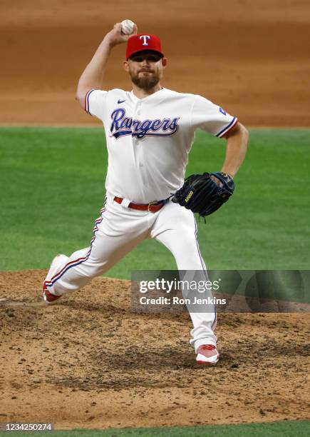 Ian Kennedy of the Texas Rangers pitches against the Arizona Diamondbacks during the ninth inning at Globe Life Field on July 27, 2021 in Arlington,...