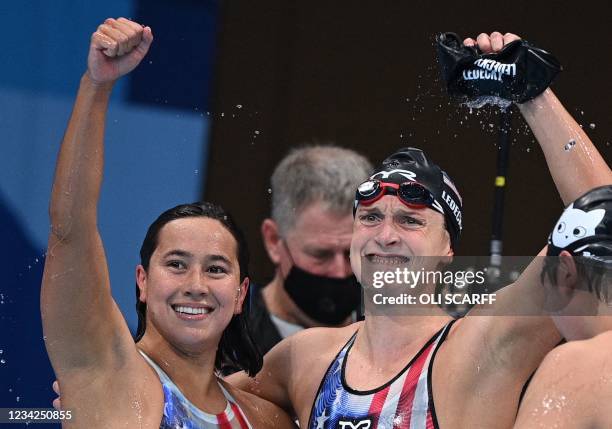 First placed USA's Kathleen Ledecky and second places USA's Erica Sullivan celebrate after the final of the women's 1500m freestyle swimming event...