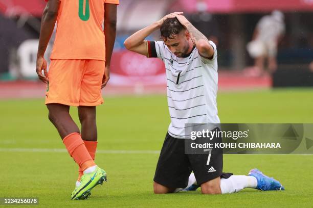 Germany's forward Marco Richter reacts during the Tokyo 2020 Olympic Games men's group D first round football match between Germany and Ivory Coast...