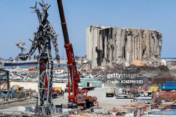 This picture taken on July 28, 2021 shows a view of a 25-metre-tall steel sculpture dubbed "The Gesture" by Lebanese artist Nadim Karam, made from...