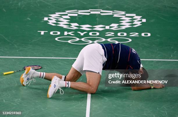 Guatemala's Kevin Cordon reacts after beating Hong Kong's Angus Ng Ka Long in their men's singles badminton group stage match during the Tokyo 2020...