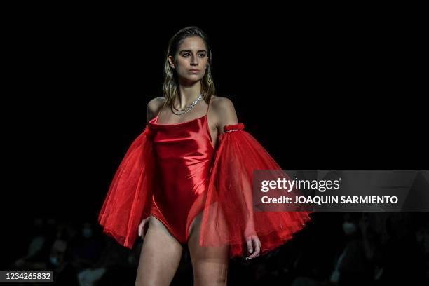 Model presents a creation during the fashion show created by students from the Bolivarian University at Colombiamoda during Medellin Fashion Week in...