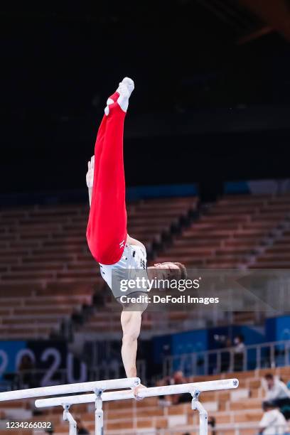 Philipp Herder of Germany competes at the parallel Bars during Artistic Gymnastics on day five of the Tokyo 2020 Olympic Games at Ariake Gymnastics...