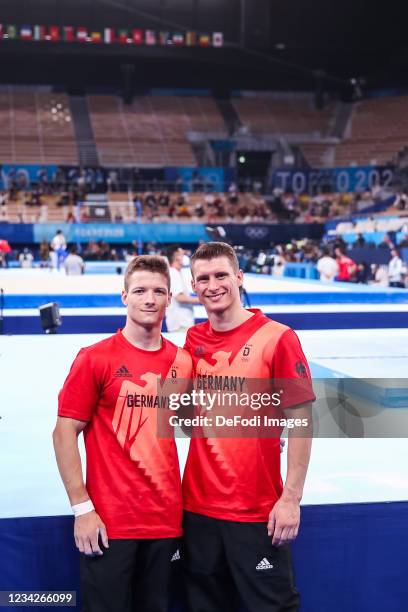 Philipp Herder of Germany and Lukas Dauser of Germany compete during Artistic Gymnastics on day five of the Tokyo 2020 Olympic Games at Ariake...