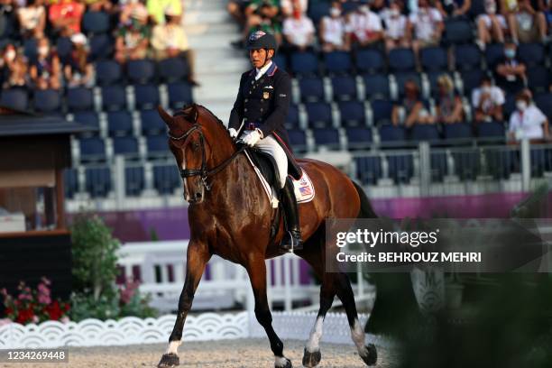Steffen Peters of the US rides Suppenkasper in the dressage grand prix freestyle individual finals during the Tokyo 2020 Olympic Games at the...