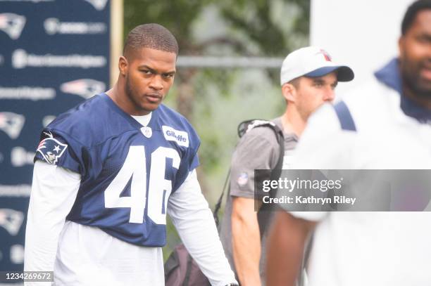 Raekwon McMillan of the New England Patriots walks onto the field during training camp at Gillette Stadium on July 28, 2021 in Foxborough,...