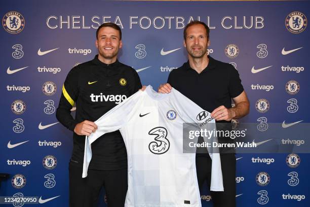 Marcus Bettinelli of Chelsea signs for Chelsea Football Club with Technical / Performance Advisor Petr Cech at Chelsea Training Ground on July 28,...