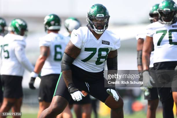 Morgan Moses of the New York Jets during morning practice at Atlantic Health Jets Training Center on July 28, 2021 in Florham Park, New Jersey.